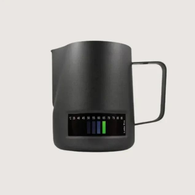 black espresso machine milk jug with built in thermometer showing temperature reading