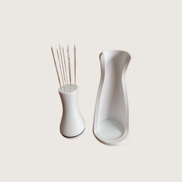 WDT Tool and separate holder shown side by side to display individual components

