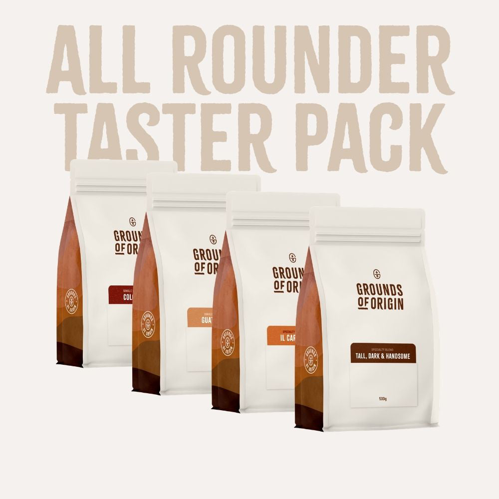 Coffee taster pack with 'Grounds of Origin' branding on a white background