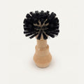 Coffee basket Cleaning brush with black bristles on a white background