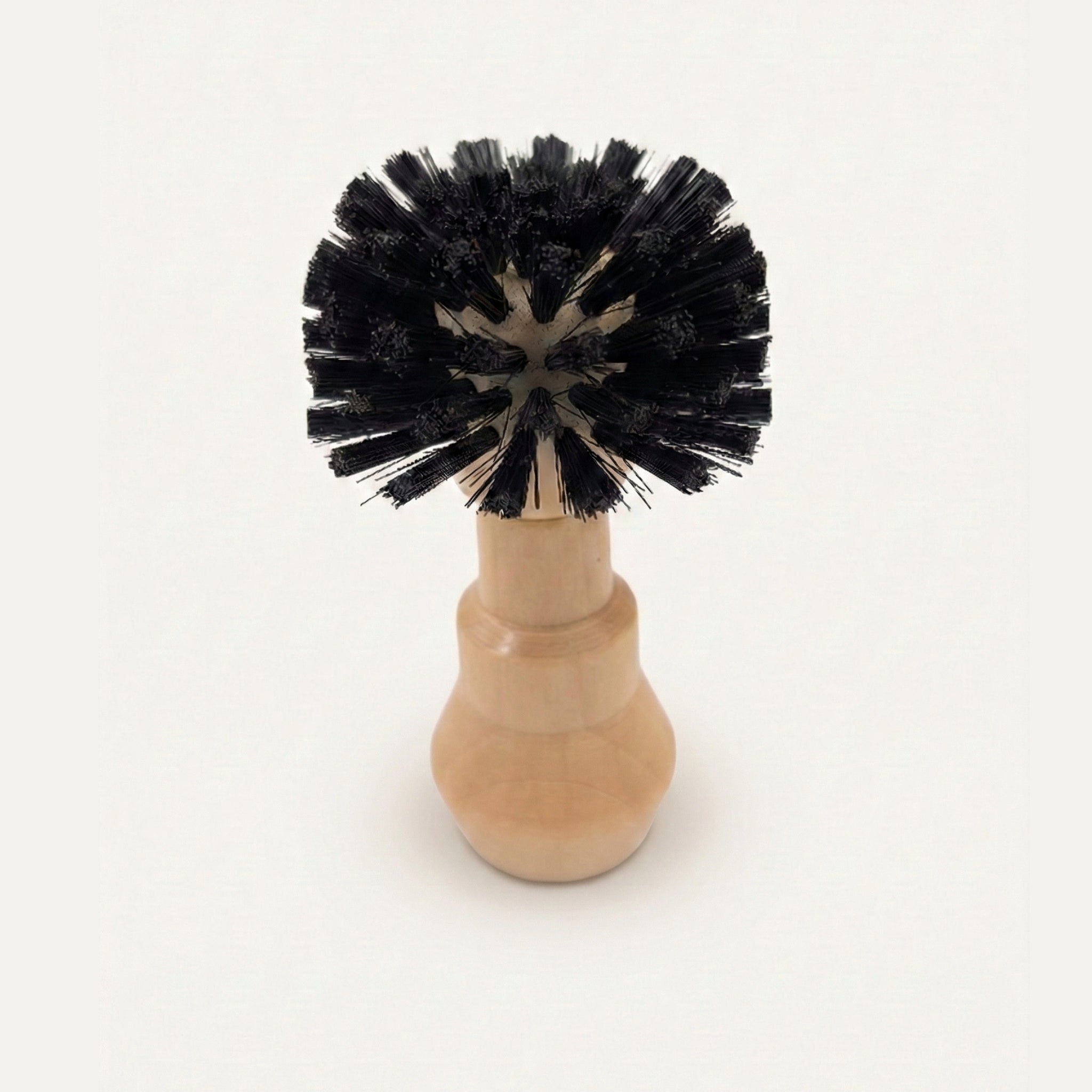 Coffee basket Cleaning brush with black bristles on a white background