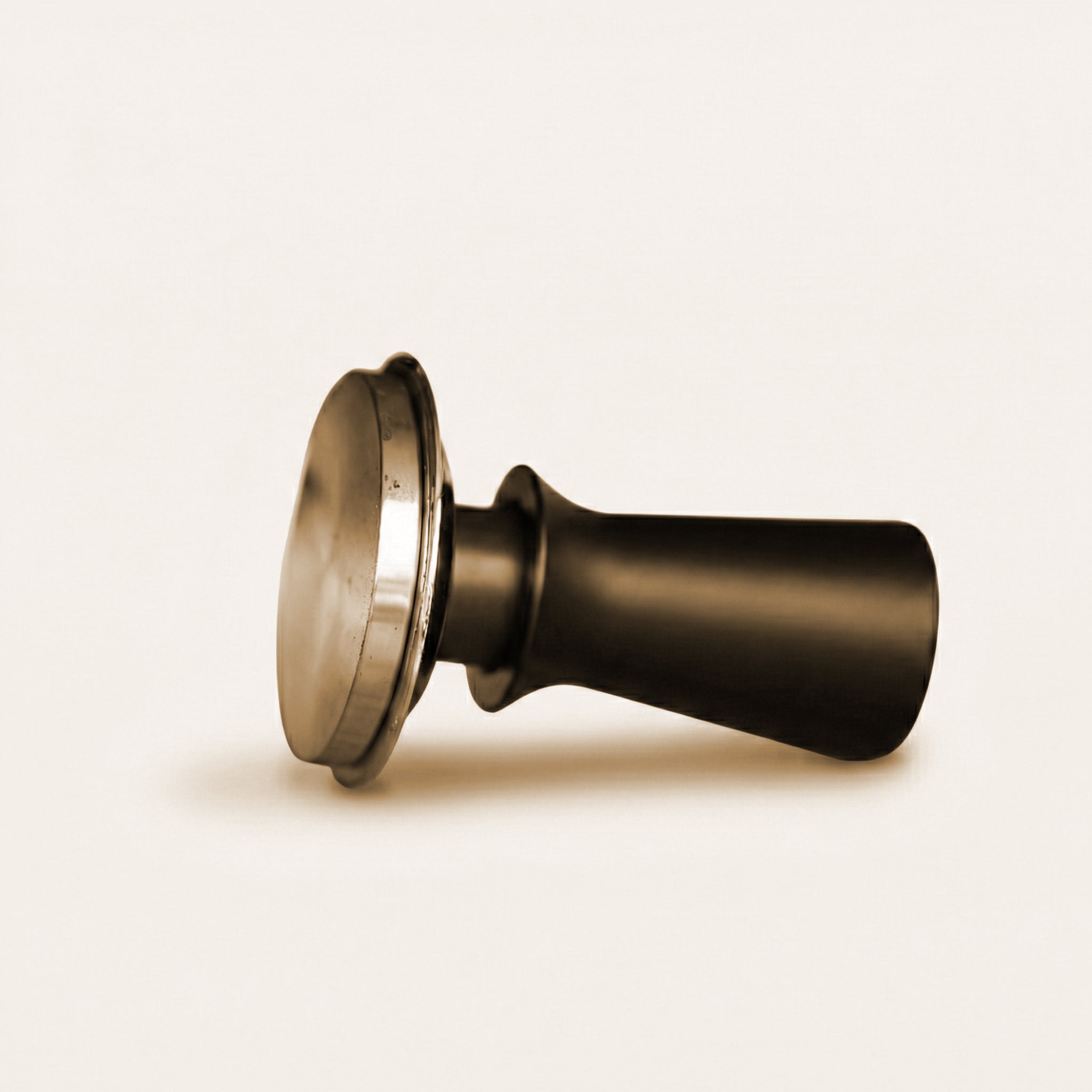 Spring loaded Coffee tamper on white background