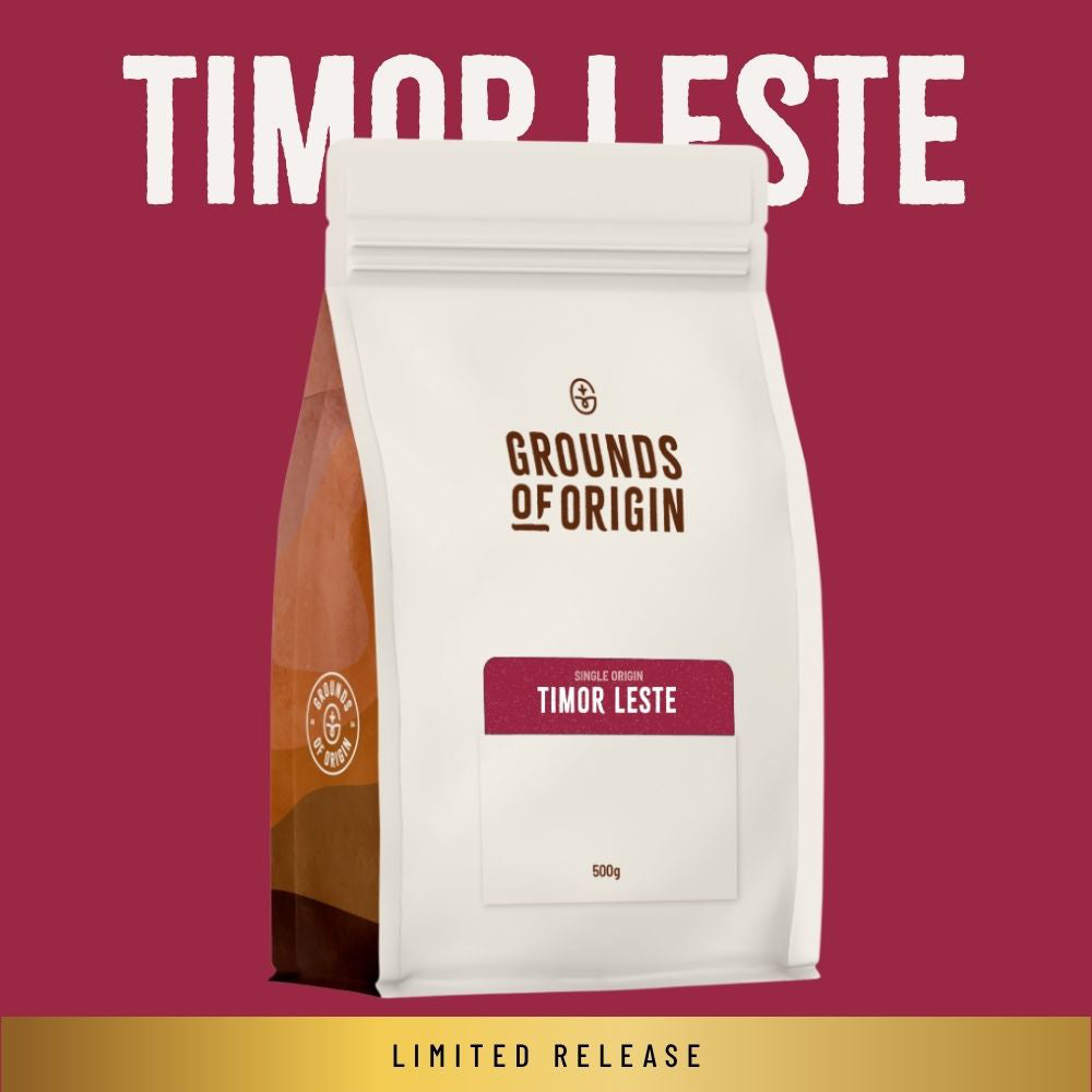 Coffee bag labeled 'Grounds of Origin' with 'Timor Leste' on a red background